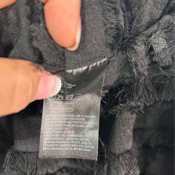 Woman’s black fringe skirt with pockets. Size 10. - Picture 7 of 10